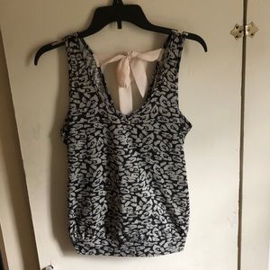 Open tie back tank